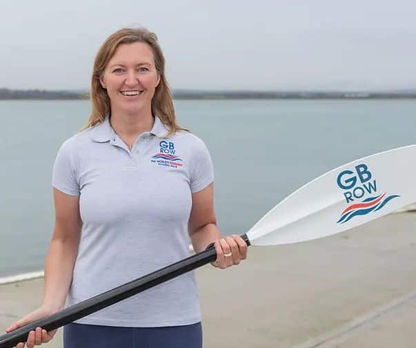 Female ocean rower Emma Wolstenholme holding a rowing oar