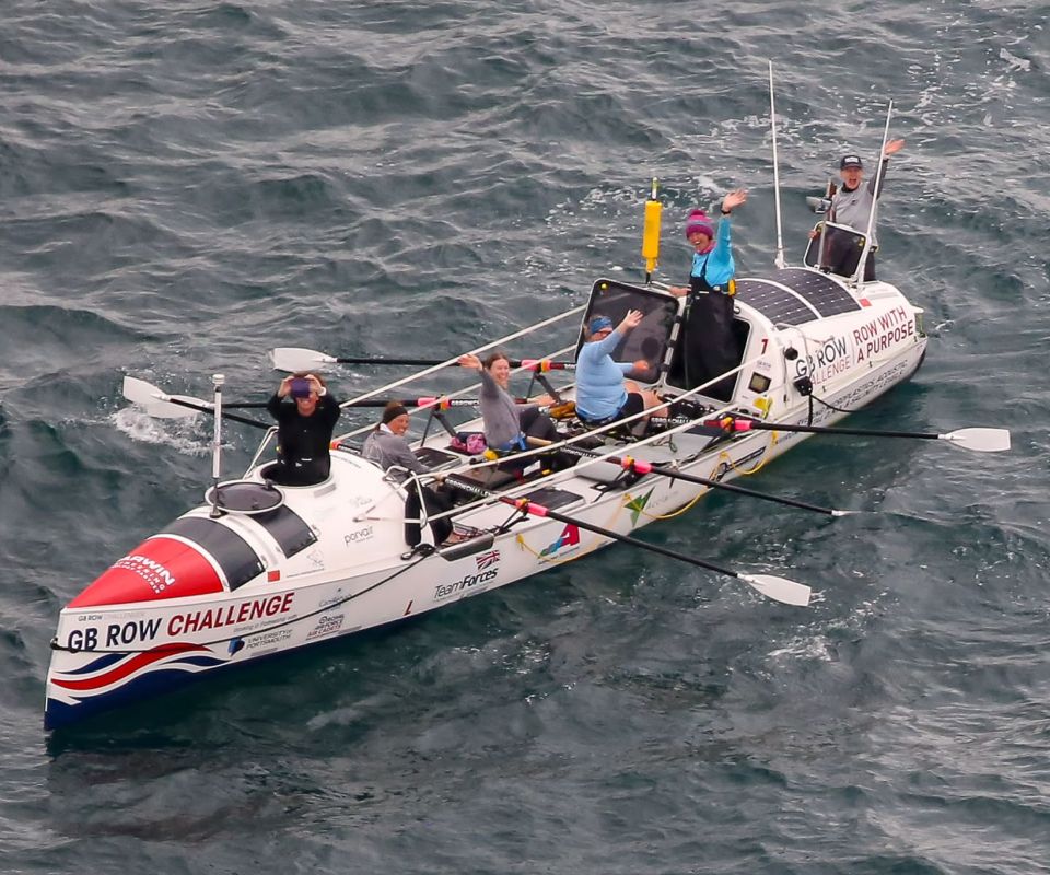 Team Ithaca's rowing boat on the ocean on their way round Great Britain