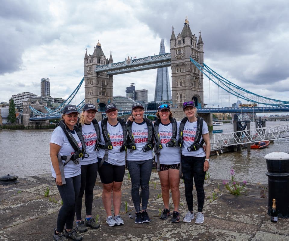 Team Ithaca on dry land after rowing around Great Britain